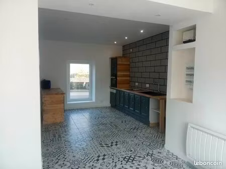 maison mitoyenne en plein bourg