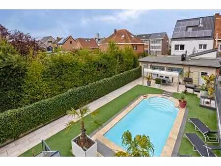 renovated house with solar panels and swimming pool