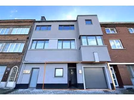 rez-de-chaussée lumineux de ±144 m² : 2 chambres  garage et