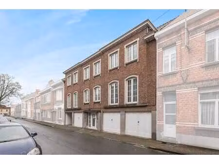 immeuble de rapport avec 4 appartements et garages