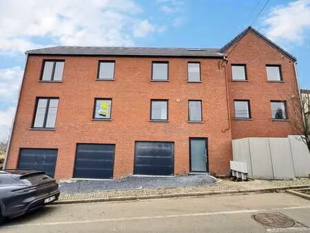 logement neuf avec double garage et jardin