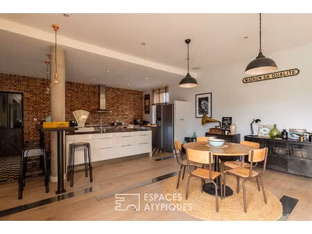 ancien atelier auto réhabilité en maison contemporaine