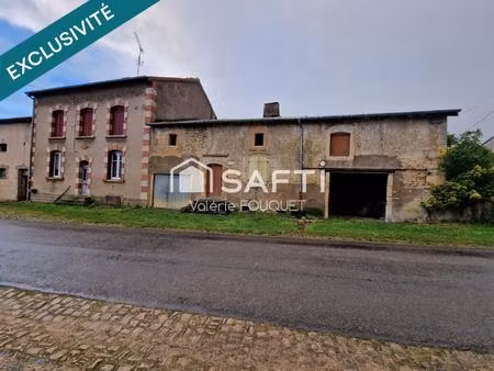 situé à vaudoncourt bel ensemble immobilier de caractère avec dépendances sur grand terrai
