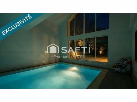 villa d’exception au cœur de la ria d’étel  parc paysager et piscine intérieure