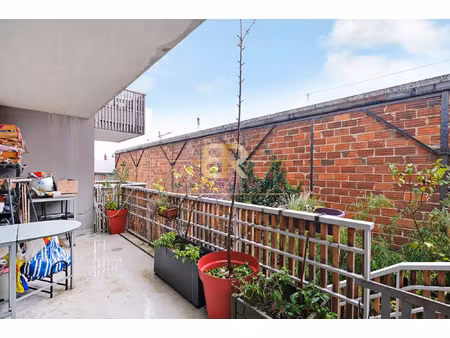 porte de paris / parking / traversant / metro / 3 pieces /