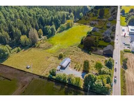 2 maisons de commerce + zone agricole en supplément