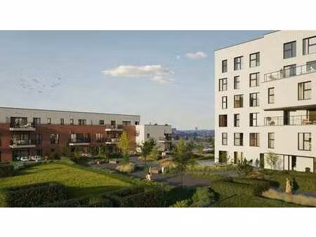 appartement avec jardin dans un projet neuf le long du canal