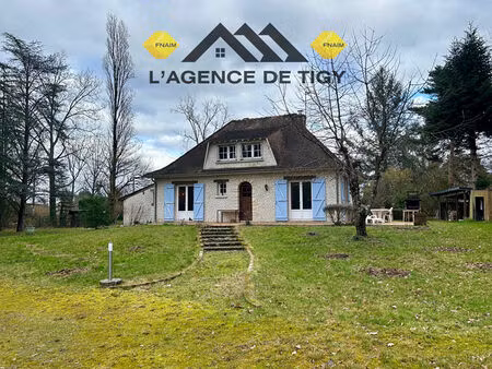 charmante maison avec plan d'eau