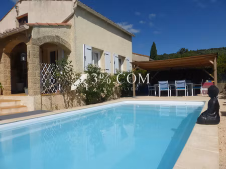 maison plain pied avec garage  piscine et jardin attenant.