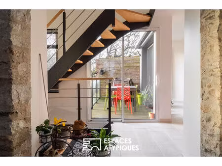 maison de ville d'une superficie de 177 m² avec un garage