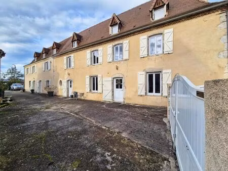 maison de 9 pièces de 400 m² située à maslacq