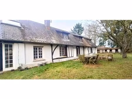 maison de 7 pièces de 120 m² à mesnils-sur-iton