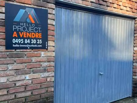 3 garages sur terrain de 523 m²