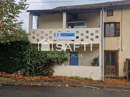 bureau de 20 m² en rdc  appartement 49 m² au 1 er étage.