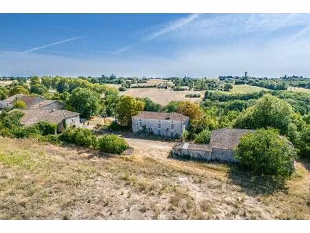 maison en pierre à renover avec 3 granges