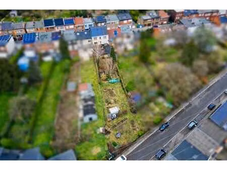 maison divisée en 2 appartements + terrain constructible