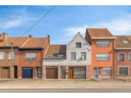 ruime tussenwoning met 4 slaapkamers  garage en zuidgeric...