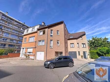 immeuble de rapport de 4 appartements-maison bifamiliale