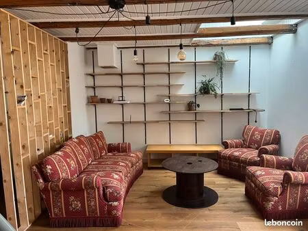 t2 bis avec place de parking et combles aménagées