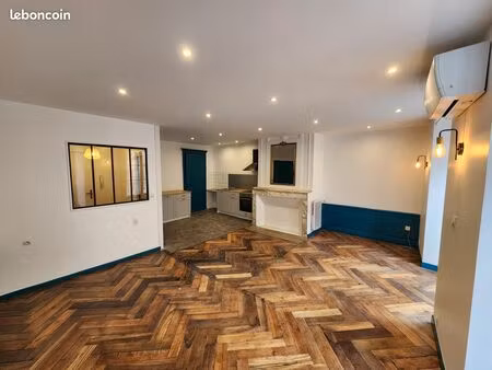 f2 lumineux de 60m² avec cuisine équipée et clim réversible en centre ville