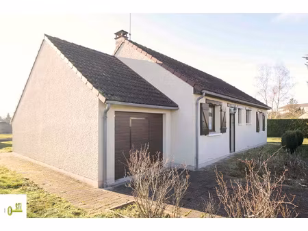 maison de plain-pied avec garage et jardin