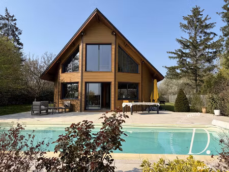 une maison d'exception en ossature bois d'environ 200 m2  au c