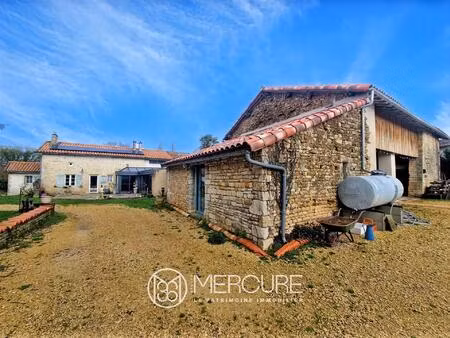 ancien corps de ferme rénové en pierre sur 1.5 ha