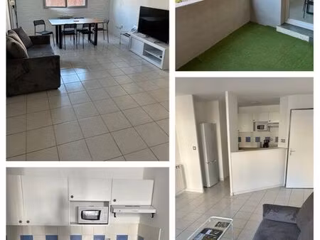 appartement centre ville / place de parking couverte / balcon