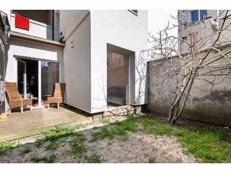 rez-de-chaussée 57m² avec jardin privé – rue calme