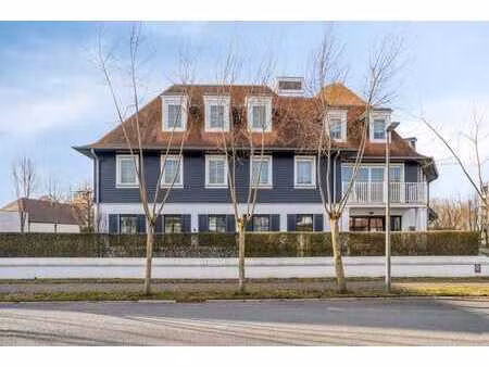 gezellig en lichtrijk hoekappartement met privatieve tuin