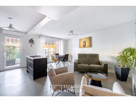 appartement sur la place du promenoir avec garage double et terrasse