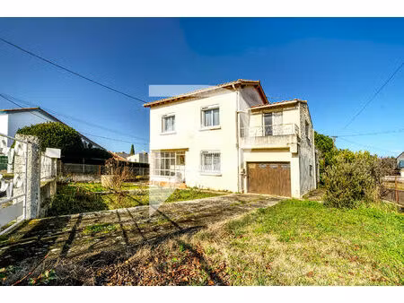 maison années 70 avec jardin  garage et combles aménageables à carcassonne