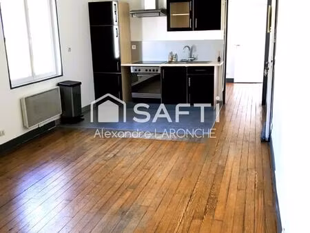 appartement avec combles aménageables   parking  garage  cave donnant accès à un jardinet.