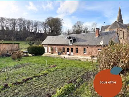 maison de caractère en briques avec chaudière et insert récents