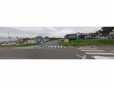 vente murs occupés dans zone commerciale