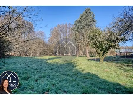 magnifique terrain constructible de 1433m2 - située au calme dans une commune recherchée d