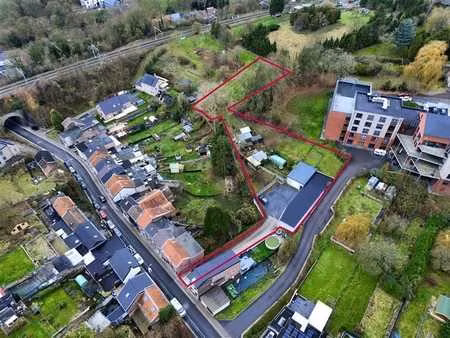 ensemble immobilier polyvalent (garages + entrepot+ terrain)