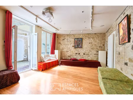 appartement-atelier avec cour privative à jules joffrin