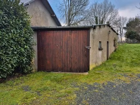 hangar + jardin 700m²