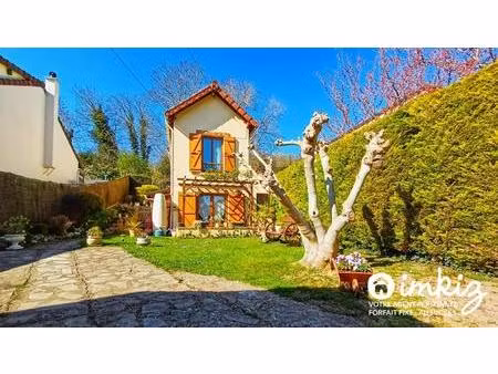 bord de seine  maison sur jardin paysagé