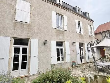 maison bourgeoise avec jardin et espace professionnel