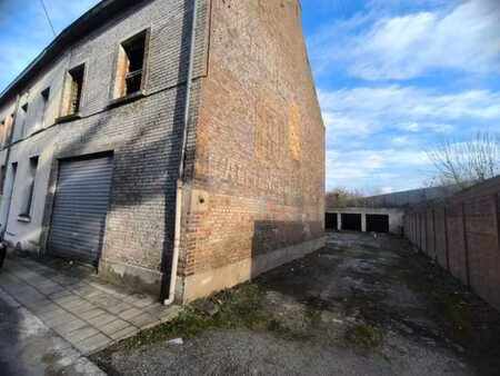 maison unifamiliale a renover avec 4 garages