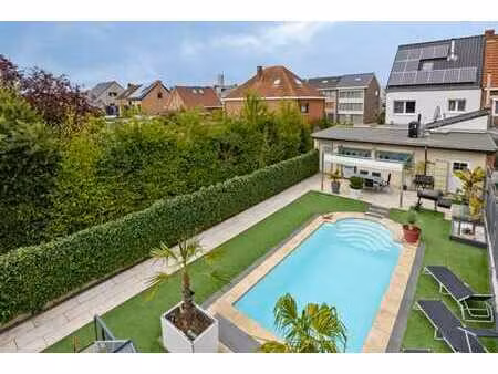 renovated house with solar panels and swimming pool