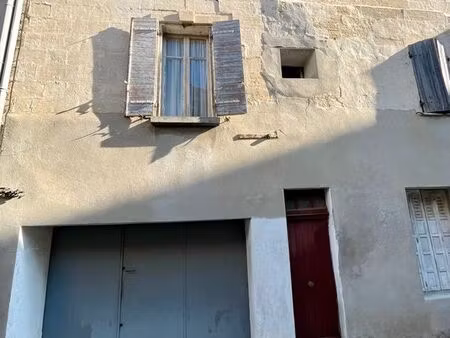 spacieuse maison de ville avec garage et terrase à rénover