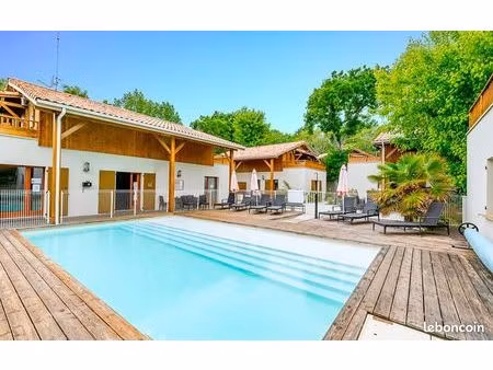 t2 meublé avec terrasse à deux pas du lac (moutchic)