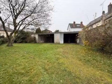 bâtiment avec grand garage + local bureau