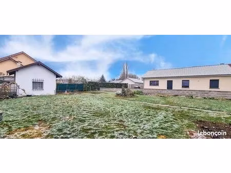 appartement avec un sous sol  terrain + un terrain constructible