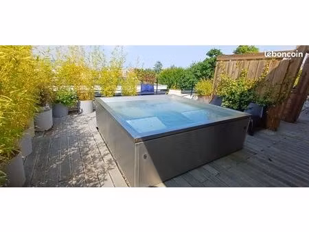 rooftop unique à chamalières  terrasse de 145 m2 avec spa