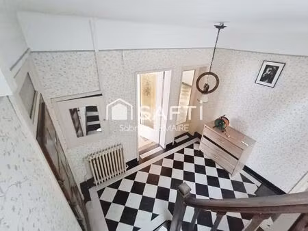 charmante maison en plein centre du village