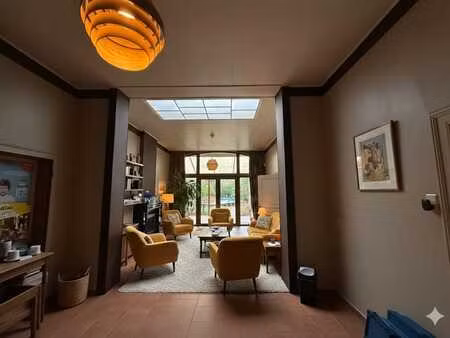 maison (+-250m2) + commerce ±40 m²